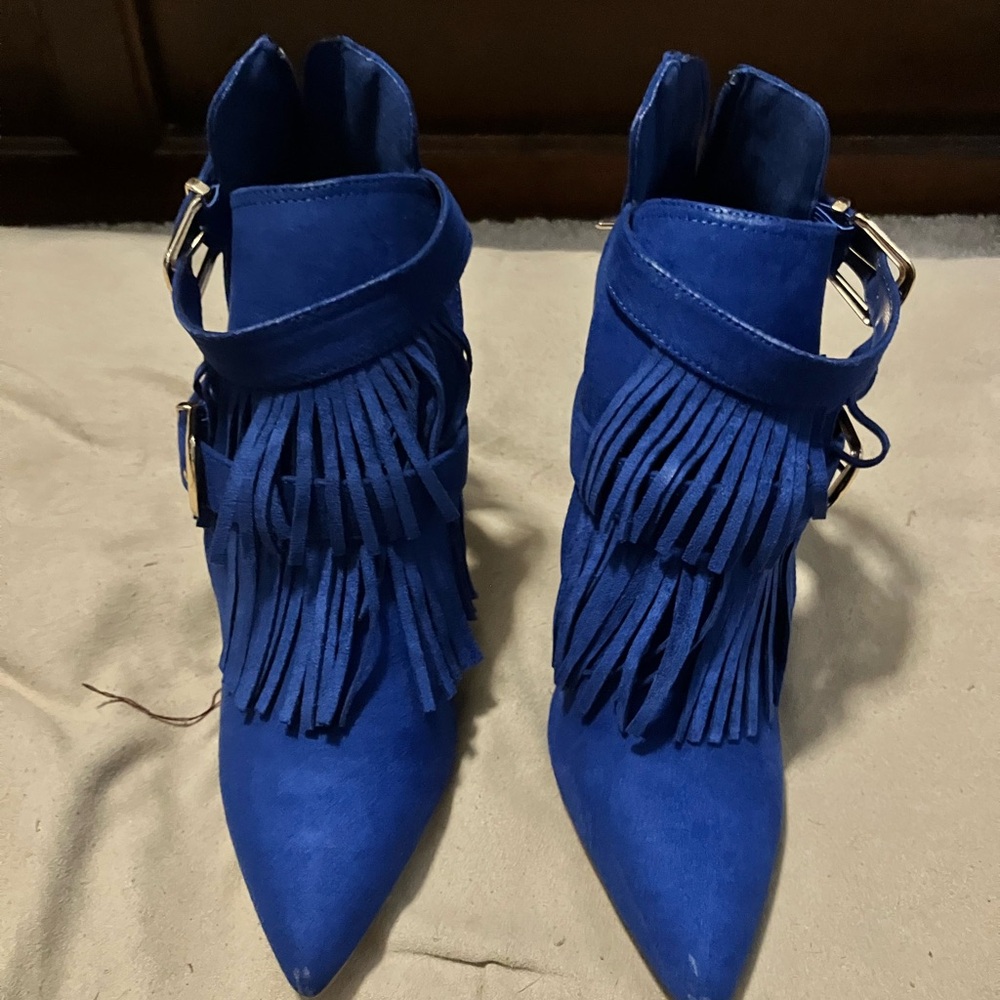 Blue women’s heels. Never worn.